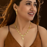 Close-up of model wearing Anti-Tarnish Gold Vine Necklace