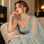 Model wearing the Jwanas Aria Turquoise Pearl Beaded Choker Set with matching drop earrings