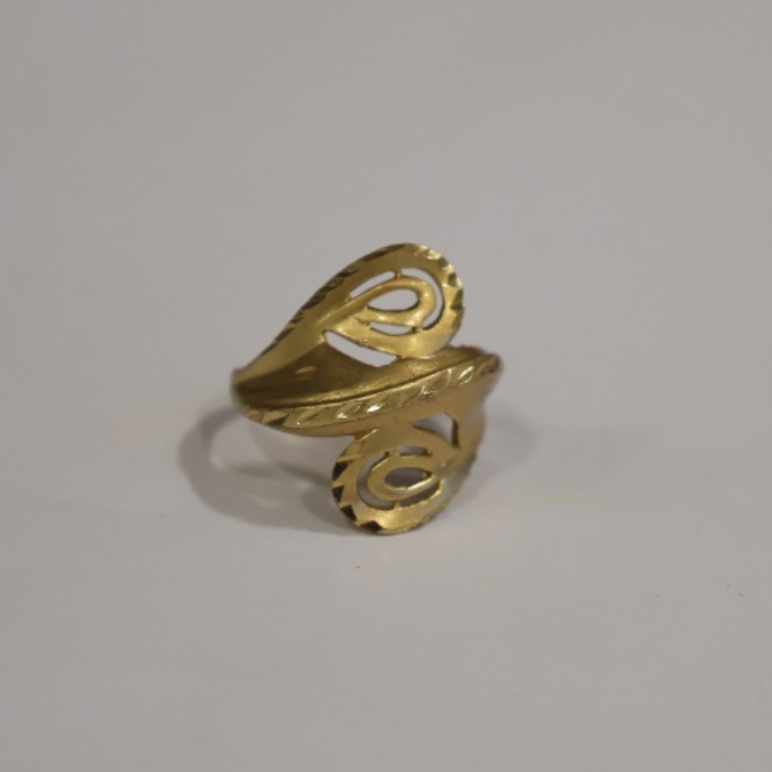 Jwanas Astra Filigree Bypass Ring close-up on grey background