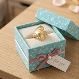 Jwanas Astra Filigree Bypass Ring displayed in jewellery box packaging