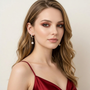 Model wearing Aura Wave Pearl Drop Earrings