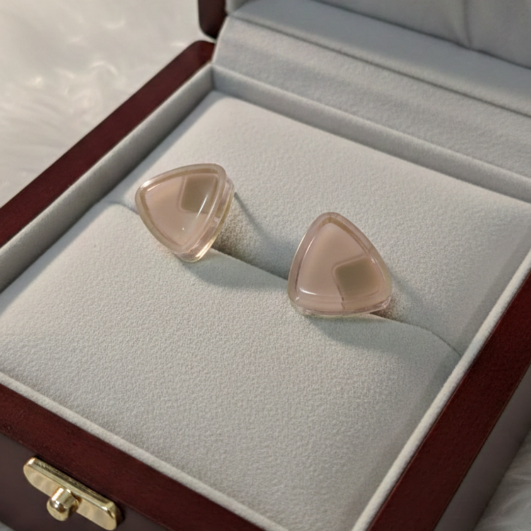 Jwanas Blush Pink Triangle Studs displayed in gift box packaging