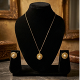 Jwanas Celestia Sunburst pendant displayed on mannequin bust