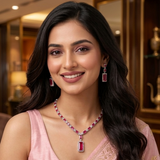 Smiling model wearing The Crimson Baguette Statement Set from Jwanas with matching drop earrings