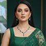 Model wearing Emerald Queen Drop Necklace Set with earrings.