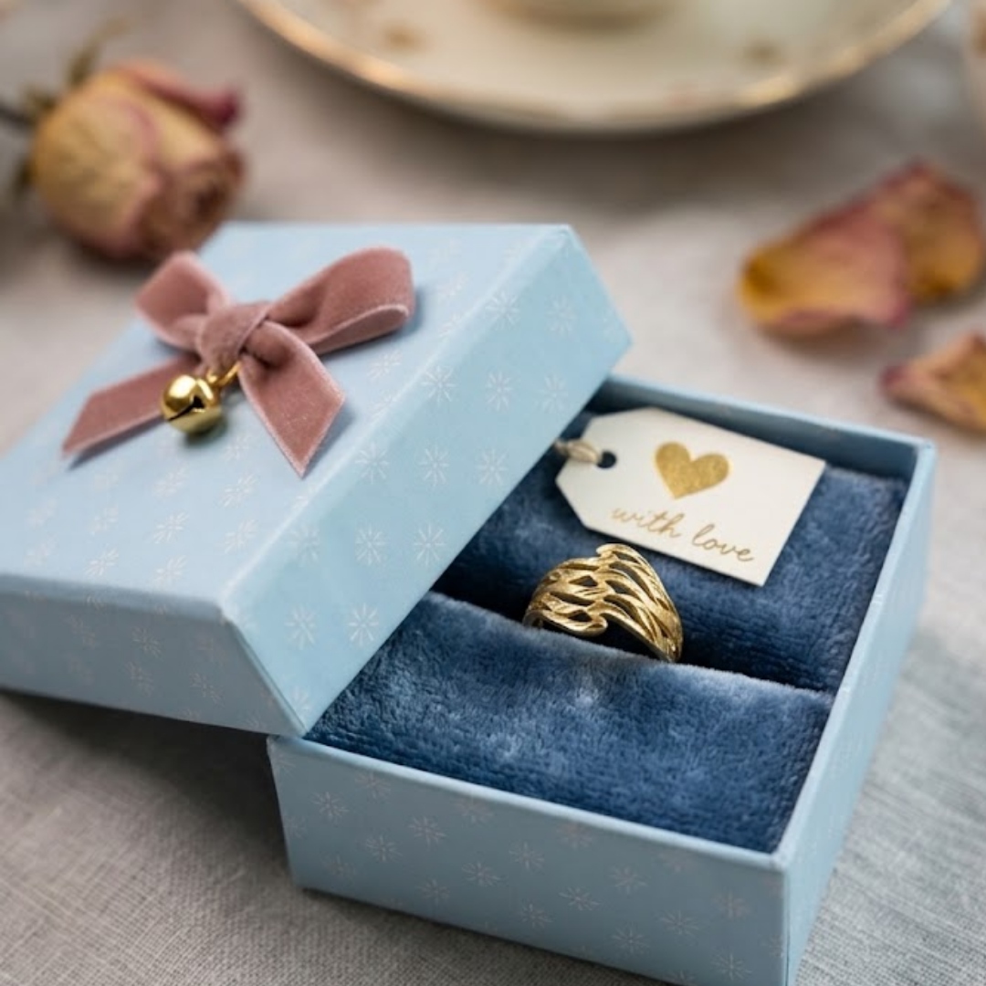 Jwanas Ethereal Wave Filigree Ring shown inside an open jewellery box