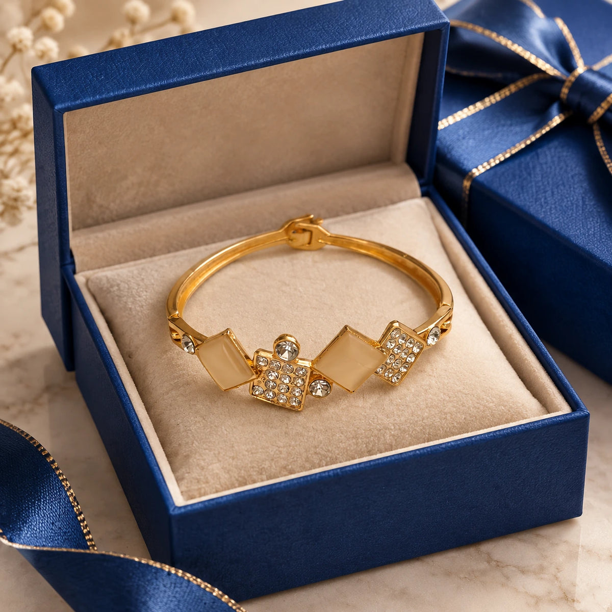 Jwanas Geometric Diamond Crystal Bangle displayed in gift box packaging