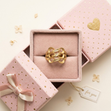 Jwanas Gilded Petal Filigree Ring displayed in jewellery box packaging