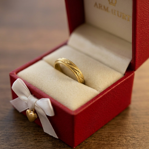 Jwanas Gilded Swirl Cocktail Ring displayed in jewellery box packaging