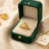 Jwanas Gilded Swirl Filigree Ring displayed in jewellery box packaging
