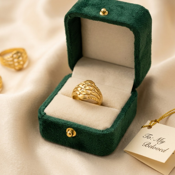 Jwanas Gilded Swirl Filigree Ring displayed in jewellery box packaging
