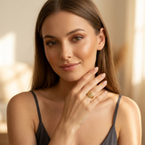 Model wearing Jwanas Gilded Swirl Filigree Ring