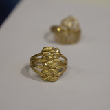 Jwanas Harvest Grain Textured Ring close-up on grey background