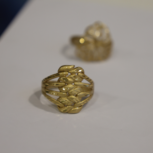 Jwanas Harvest Grain Textured Ring close-up on grey background