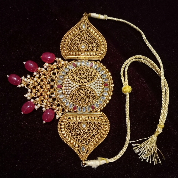 Jwanas Heritage Gold Filigree Choker flat lay on dark fabric
