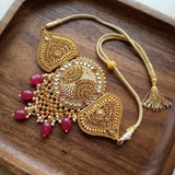 Jwanas Heritage Gold Filigree Choker flat lay on wooden tray