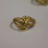 Jwanas Luna Petal Ring close-up on grey background