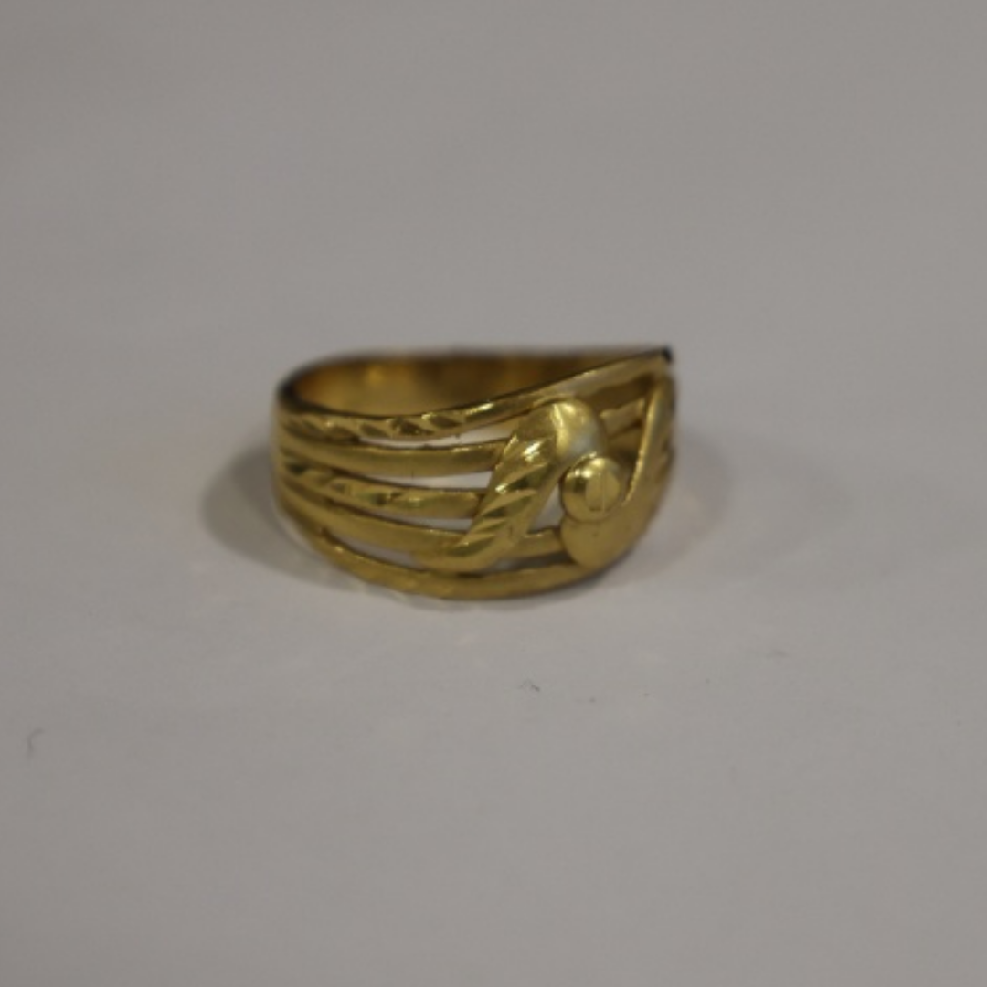 Jwanas Lyra Textured Band Ring
close-up on grey background