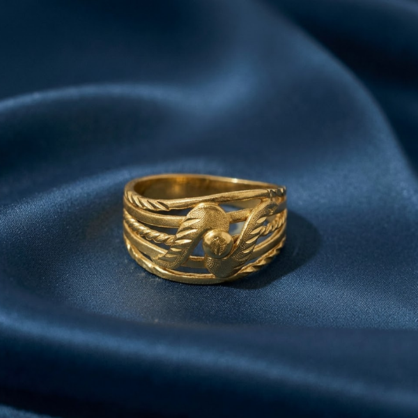 Jwanas Lyra Textured Band Ring
 flat lay on blue fabric