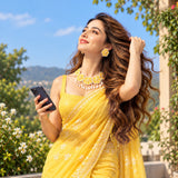 Model wearing Jwanas Marigold Bloom Handmade Necklace Set and earrings