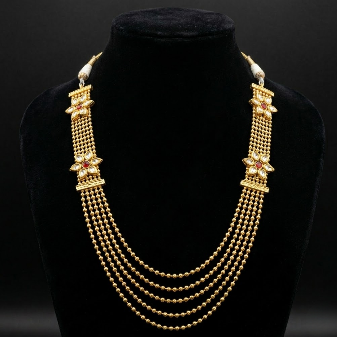 Jwanas Noor Multi-Layered Mala displayed on mannequin bust