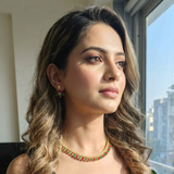 Model wearing Jwanas Royal Emerald Ruby Dual-Tone necklace