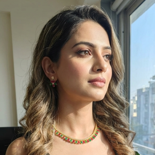 Model wearing Jwanas Royal Emerald Ruby Dual-Tone necklace