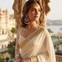 Model wearing Royal Kundan Meenakari Chandbali Earrings with pearl drops