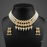 Royal Pearl and Kundan necklace set with matching earrings on mannequin.