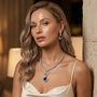 Model wearing Royal Sapphire Vine Necklace Set with earrings