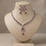 Jwanas Ruby-Inspired Teardrop Necklace Set with earrings displayed on mannequin