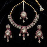 Jwanas Ruby-Toned Crystal jewellery set flat lay on fabric