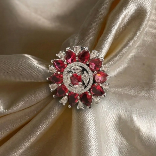 Close-up of Jwanas Ruby-radiance Sunburst Ring worn on hand