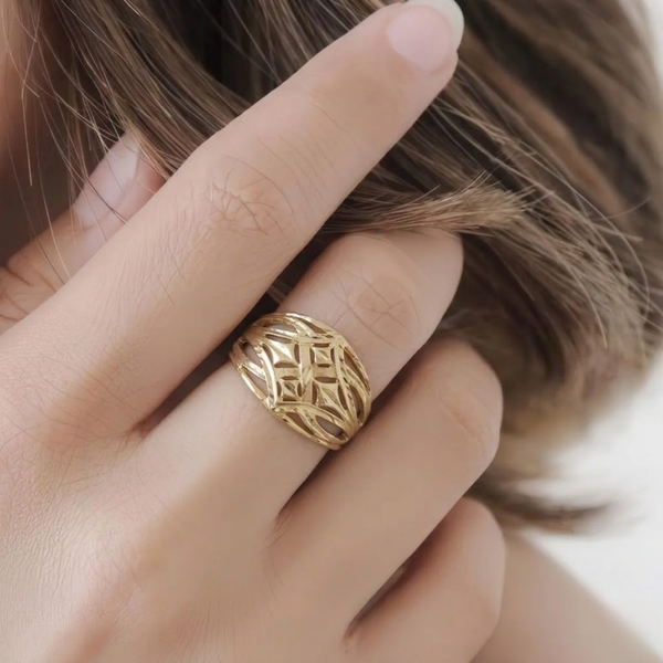 Close-up of Jwanas Solara Filigree Ring worn on hand