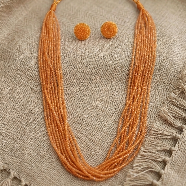 Sunset Glow Multi-Layer Beaded Necklace Set flat lay with earrings