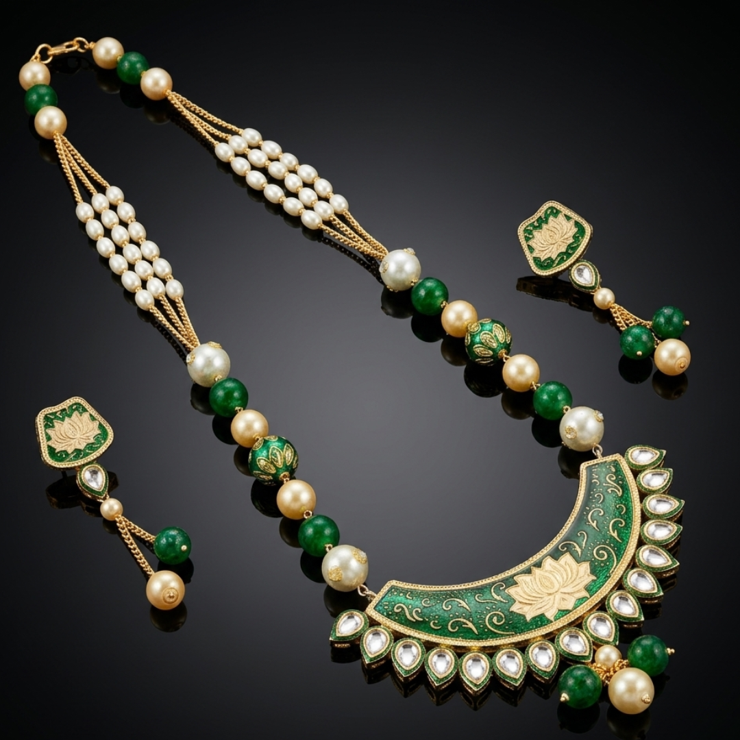 Vrinda Lotus Meenakari Mala Set flatlay featuring lotus pendant, emerald beads and pearl accents