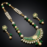 Vrinda Lotus Meenakari Mala Set flatlay featuring lotus pendant, emerald beads and pearl accents