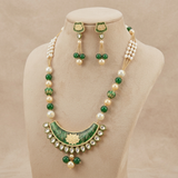 Vrinda Lotus Meenakari Mala Set displayed on mannequin with emerald green beads and pearl detailing